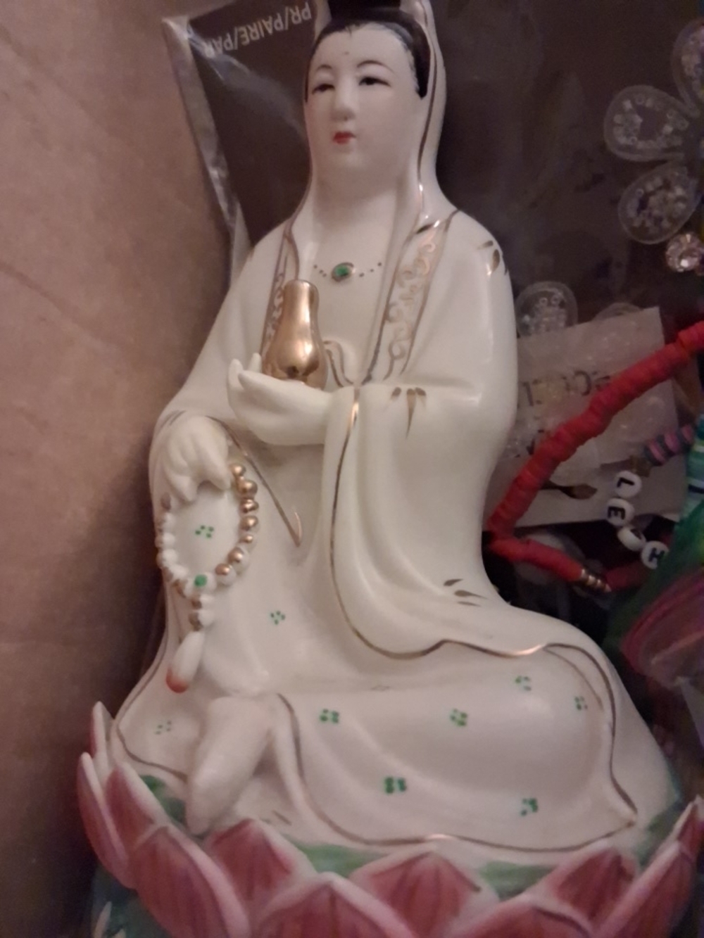 White Porcelain Figurine with Gold Accents